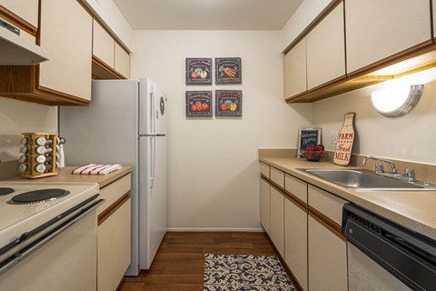 Cozy kitchen at Westwood Village Apartments in Westland, MI